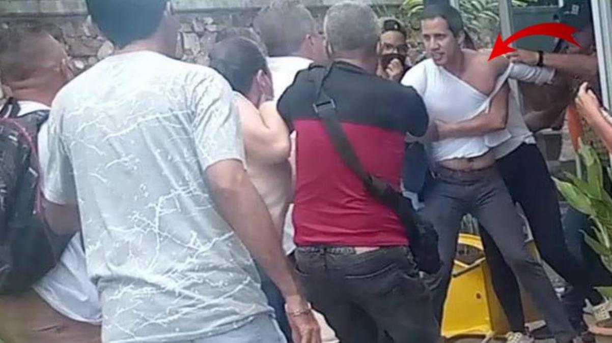 Venezuela'daki darbe girişimini başlatan muhalif lider gittiği restorandan yaka paça dışarı atıldı